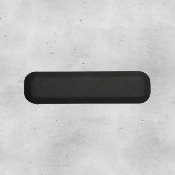 Dark rounded bar on textured gray background.