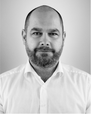 Dress shirt, Facial hair, Chin, Beard, Neck, Jaw, Sleeve, Grey, Collar