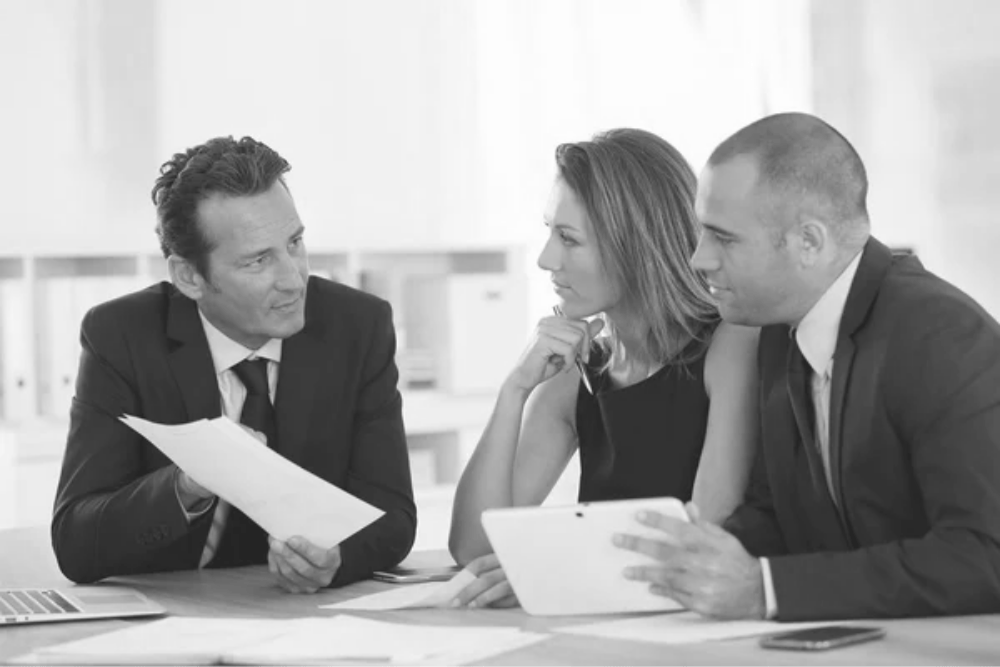 Table, Human, Black-and-white, Coat, Gesture, Tie, Style, Suit