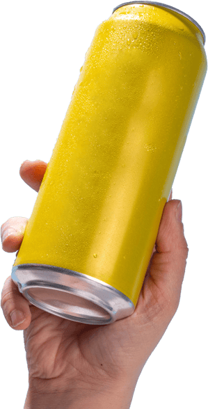 Hand holding a yellow, condensation-covered can.