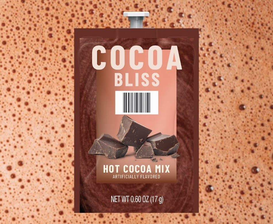 Cocoa Bliss hot cocoa mix packet with chocolate chunks on a bubbly cocoa background.