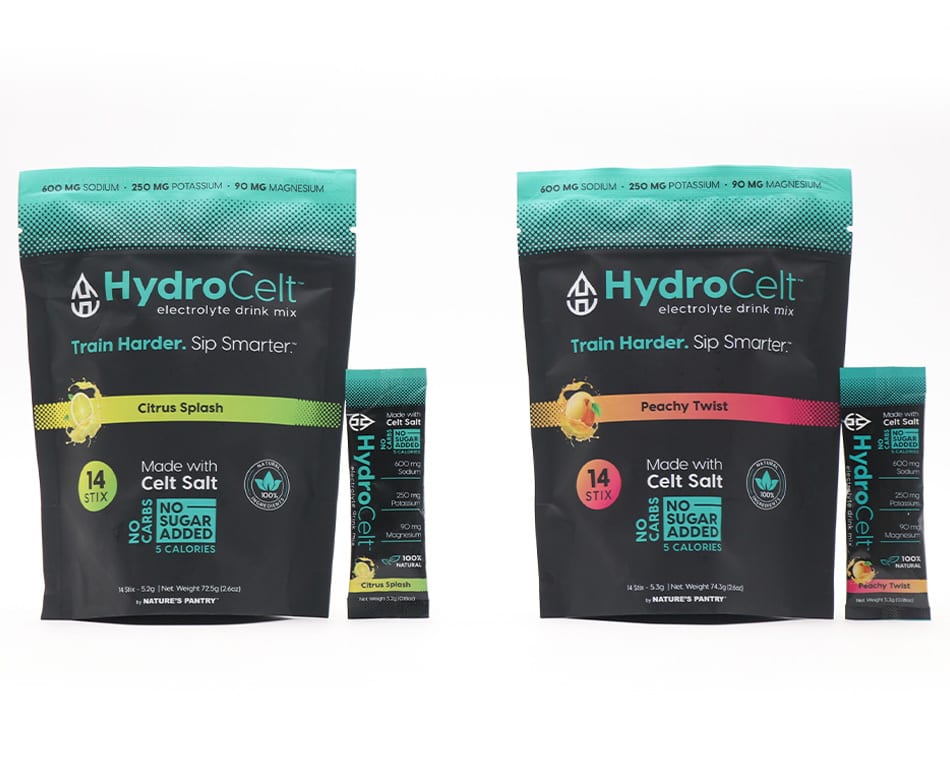 Two HydroCelt electrolyte drink mixes (Citrus Splash, Peachy Twist) with single packets.