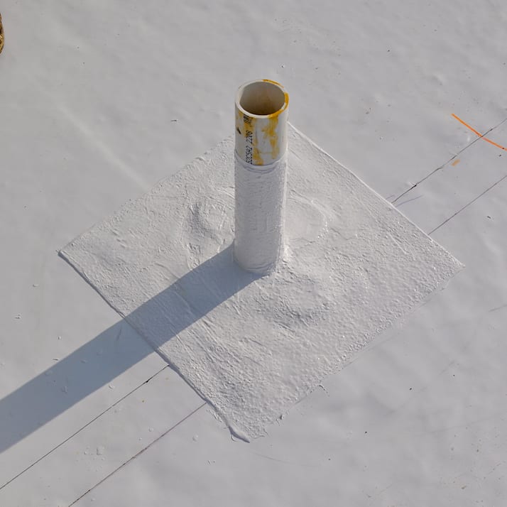 Closeup of flashing around a pipe.