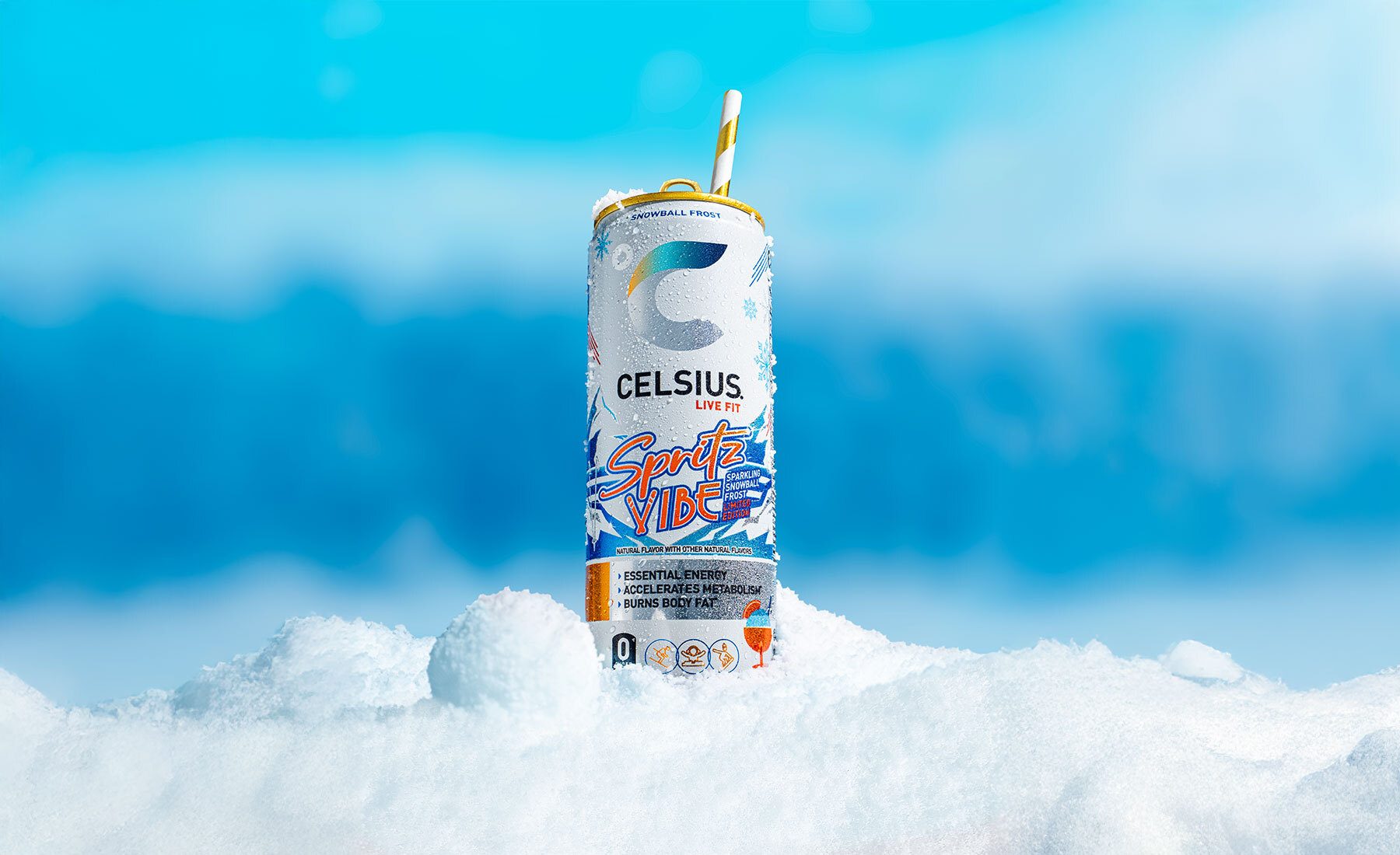 Celsius Spritz Vibe Snowball Frost can in snow with a blue background.