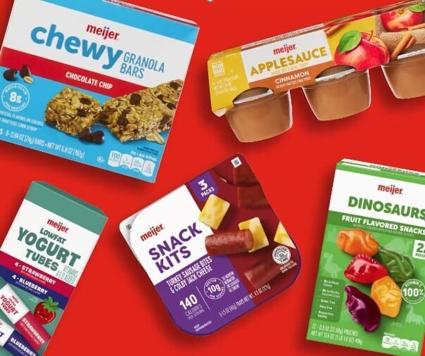 Meijer brand snacks: granola bars, applesauce, yogurt, snack kits, fruit snacks on red background.