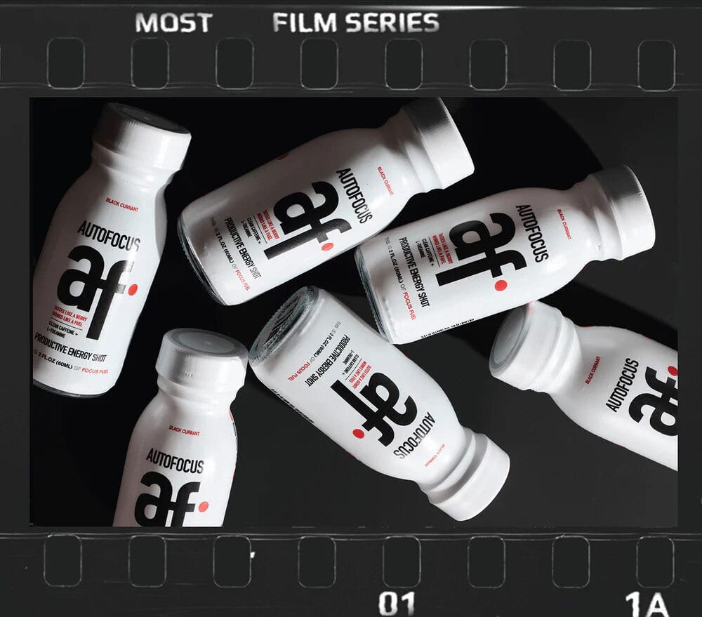 White "AUTOFOCUS af" Black Currant productive energy shots arranged with a film strip border.