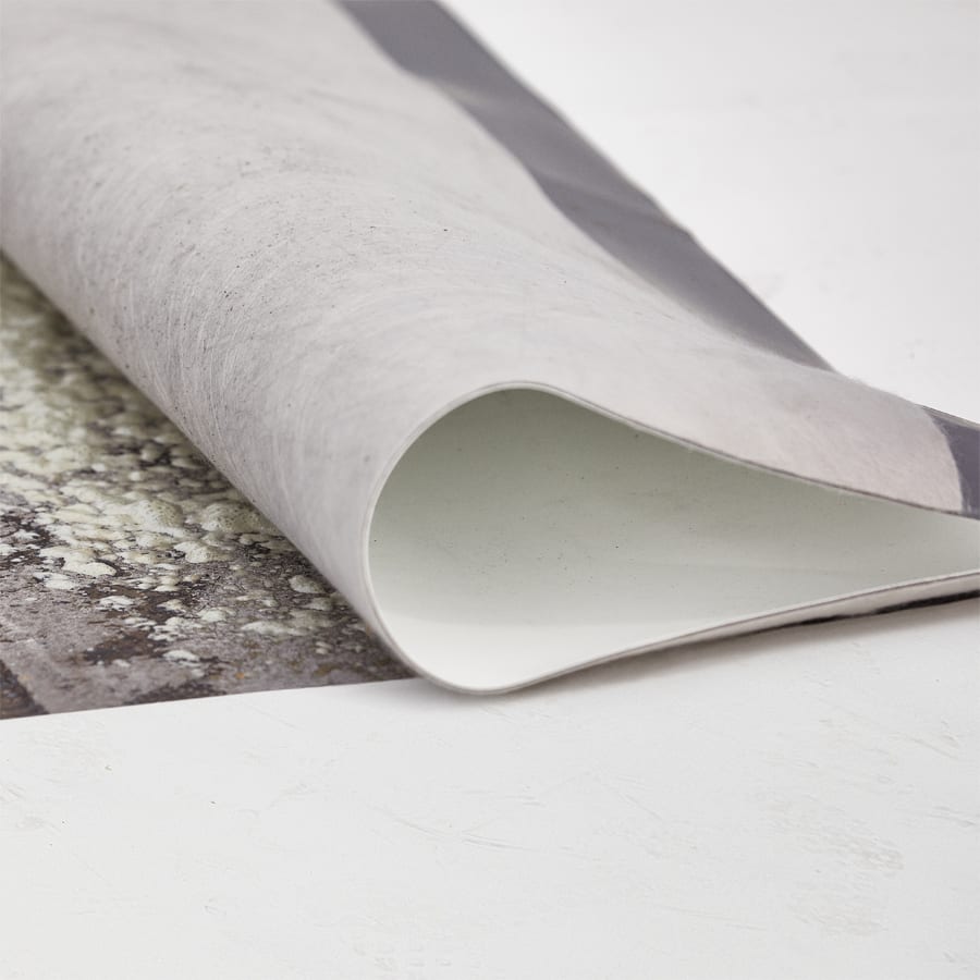 Detail of the layers of a hybrid roof system, one folded over.