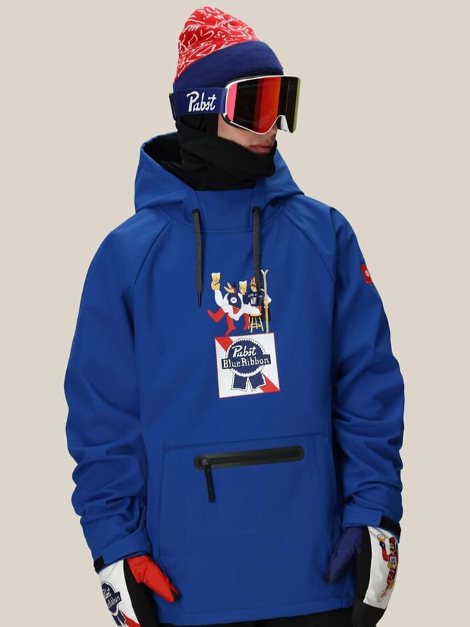 Person in a blue ski hoodie with Pabst Blue Ribbon logo, ski goggles, and a beanie.