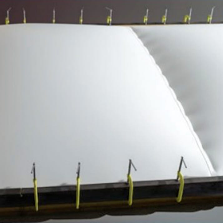 Testing for Wind Resistance of Retrofit Single Ply Over Metal Panel Systems.
