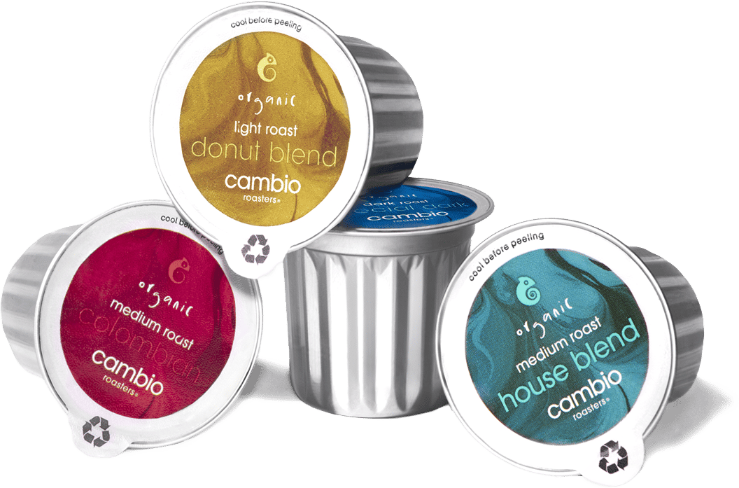 Assorted Cambio Roasters coffee pods including Donut Blend, Colombian, House Blend, and a dark roast.