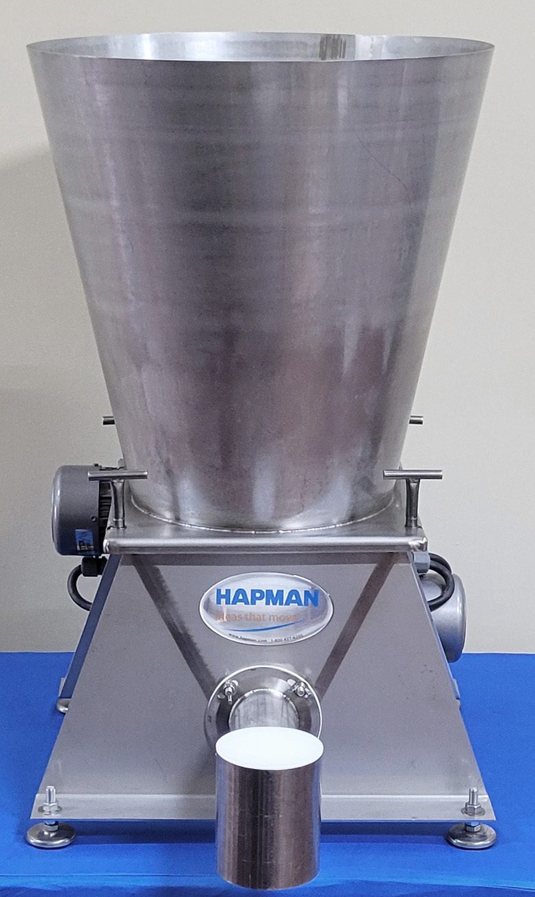 A large, conical, stainless steel industrial mixer by HAPMAN, with a cylindrical output.
