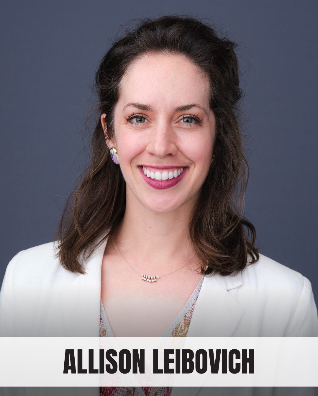 Smiling Allison Leibovich in white blazer, headshot.
