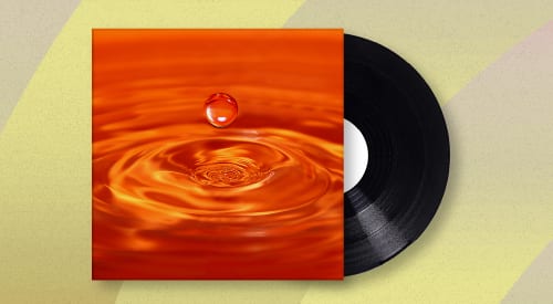 Vinyl record and its orange album cover featuring a water droplet creating ripples.