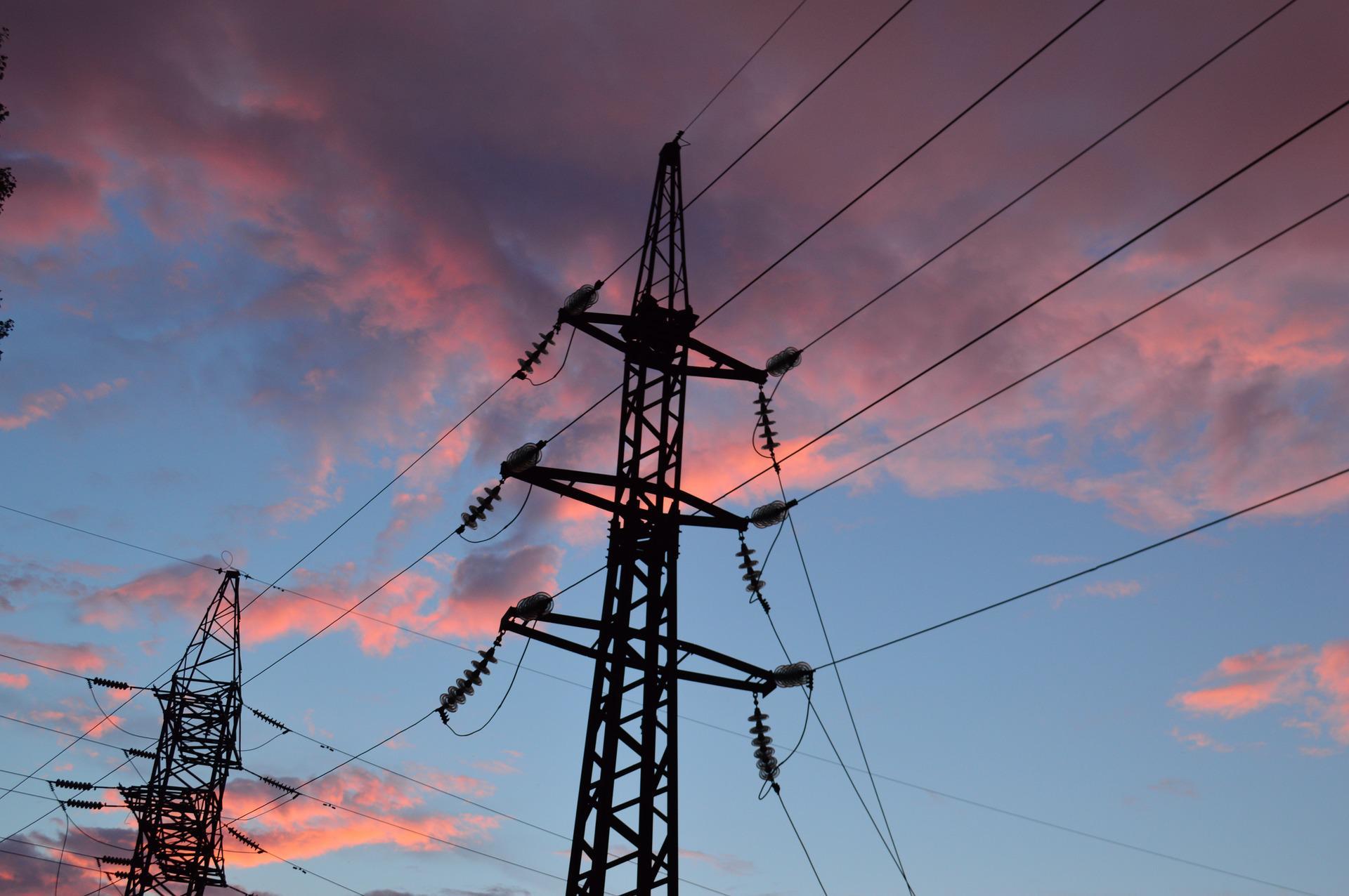 Overhead power line, Electrical wiring, Transmission tower, Cloud, Sky, Atmosphere, Afterglow, Electricity, Dusk, Tree