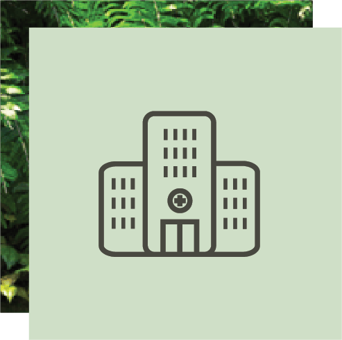 An outline icon depicting a hospital building with multiple windows and a prominent medical cross.
