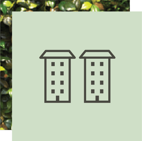 Two simple outline icons of multistory buildings with multiple windows.