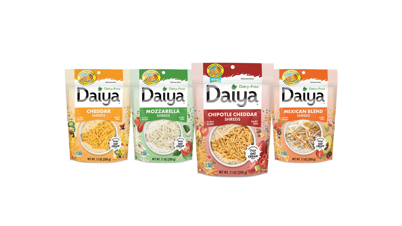 Four bags of Daiya plant-based cheese shreds: Cheddar, Mozzarella, Chipotle Cheddar, Mexican Blend.