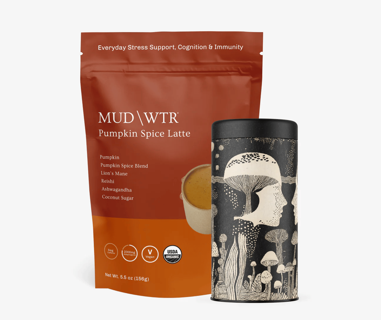 MUD\WTR Pumpkin Spice Latte powder in an orange pouch and a decorative black canister.