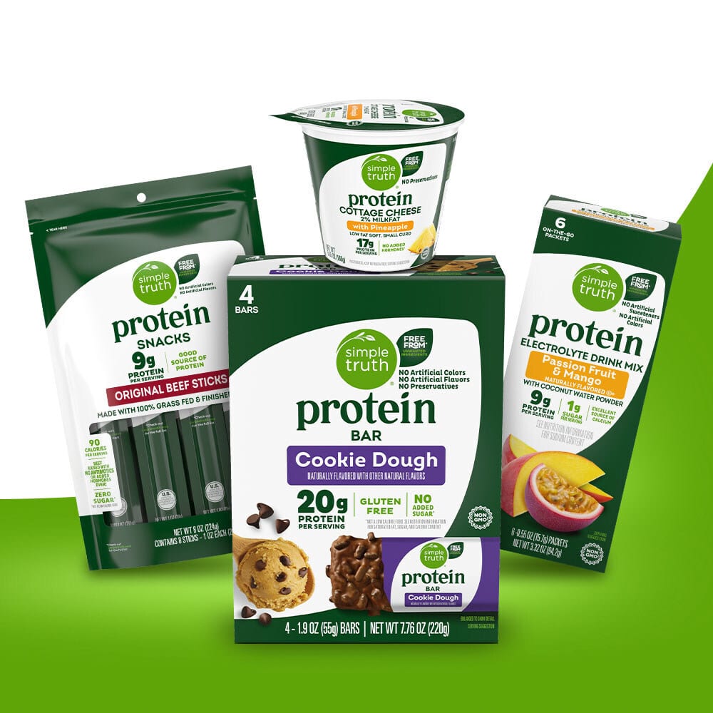 Various Simple Truth Protein products, including beef sticks, cottage cheese, protein bars, and drink mix.