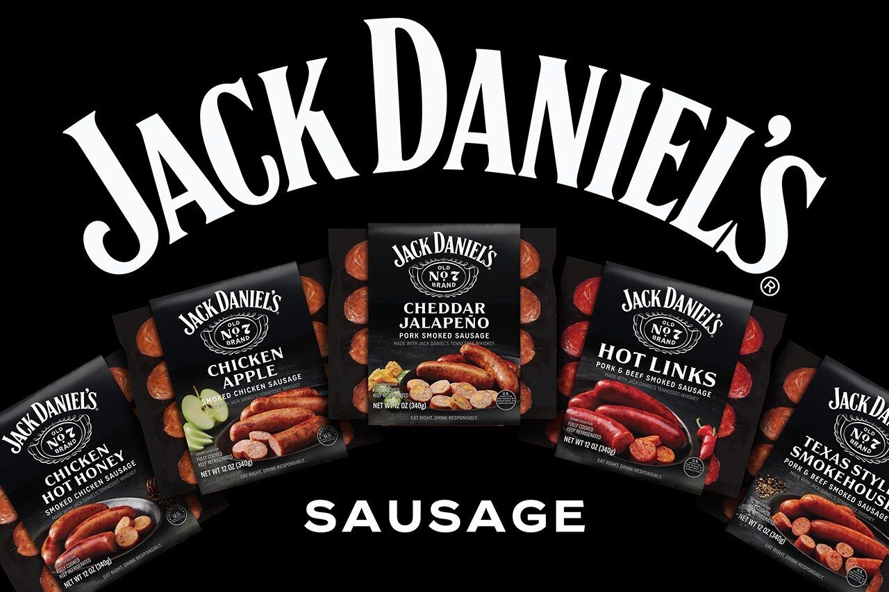 A black background displays the Jack Daniel's logo above five packages of various smoked sausages.
