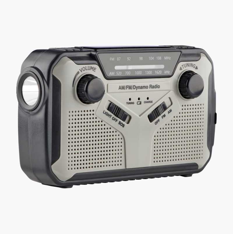 Gray and black AM/FM/Dynamo radio with built-in flashlight, volume, tuning, and mode controls.