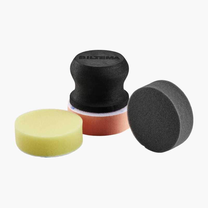 Set of Biltema car detailing sponges and applicators: black handle with orange pad, yellow, and grey foam pads.