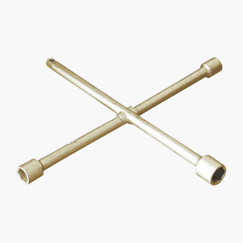 Silver cross-rim wrench with four different sized sockets for vehicle wheel lug nuts.