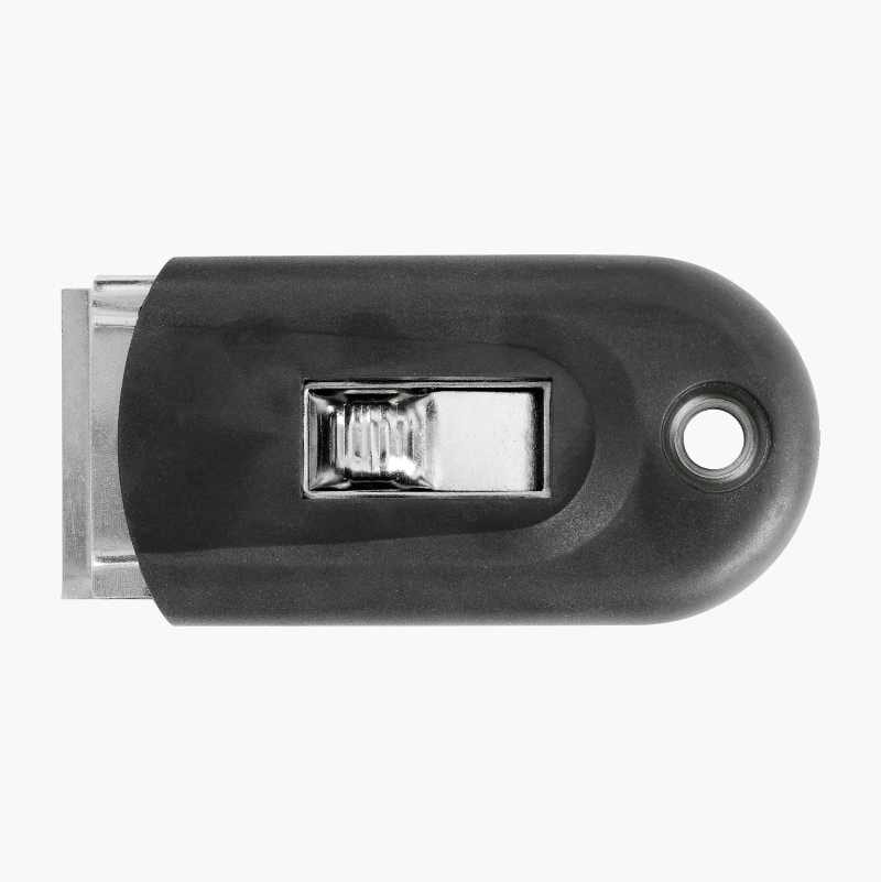 A dark gray and silver razor scraper with a sliding blade mechanism and a hanging hole on a white background.