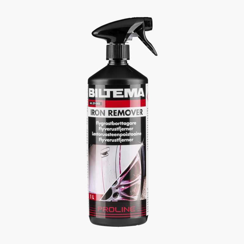 Black Biltema Proline Iron Remover spray bottle, 1L, with a car detail showing purple residue.