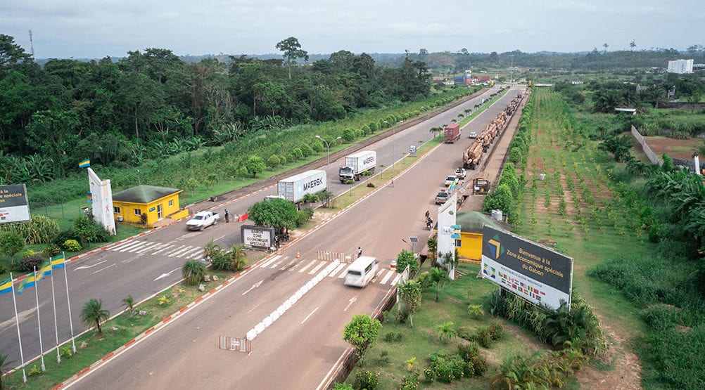 Motor vehicle, Road surface, Land lot, Plant, Car, Sky, Truck, Infrastructure, Asphalt