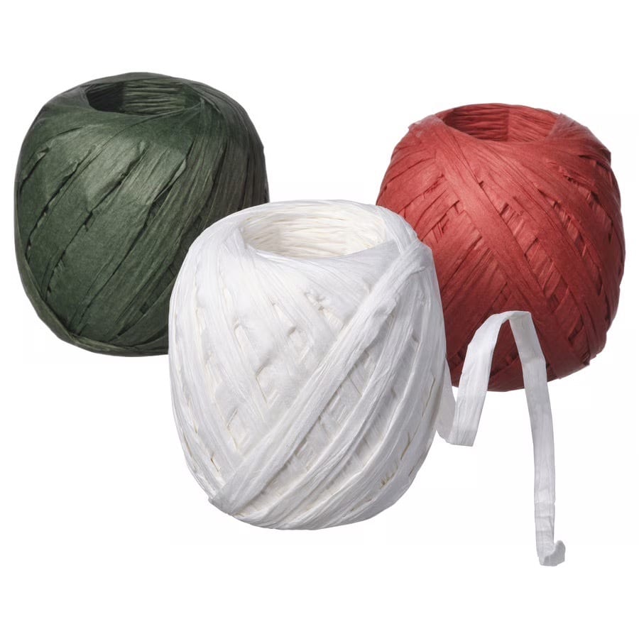 Green, white, and red paper raffia balls.