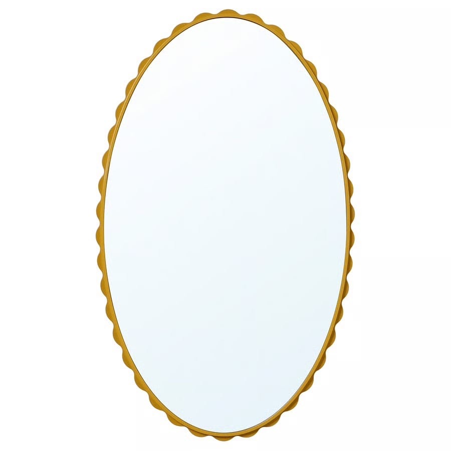 Gold scalloped oval mirror.