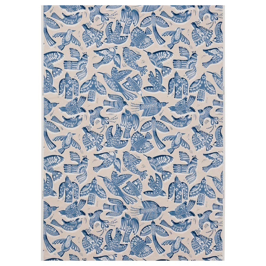 Folk art bird pattern in blue and beige.