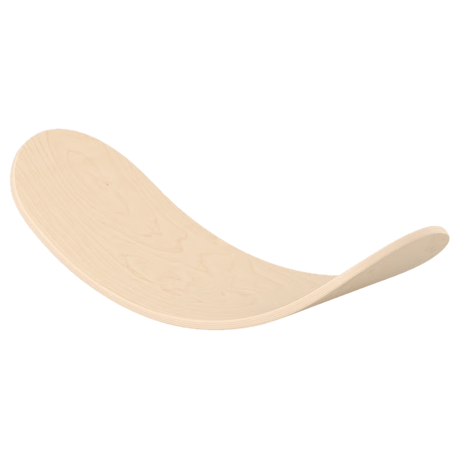 Light wood balance board on green background.