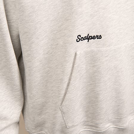 Close-up of a light grey marl hoodie featuring a black embroidered 'Scalpers' logo and a kangaroo pocket.