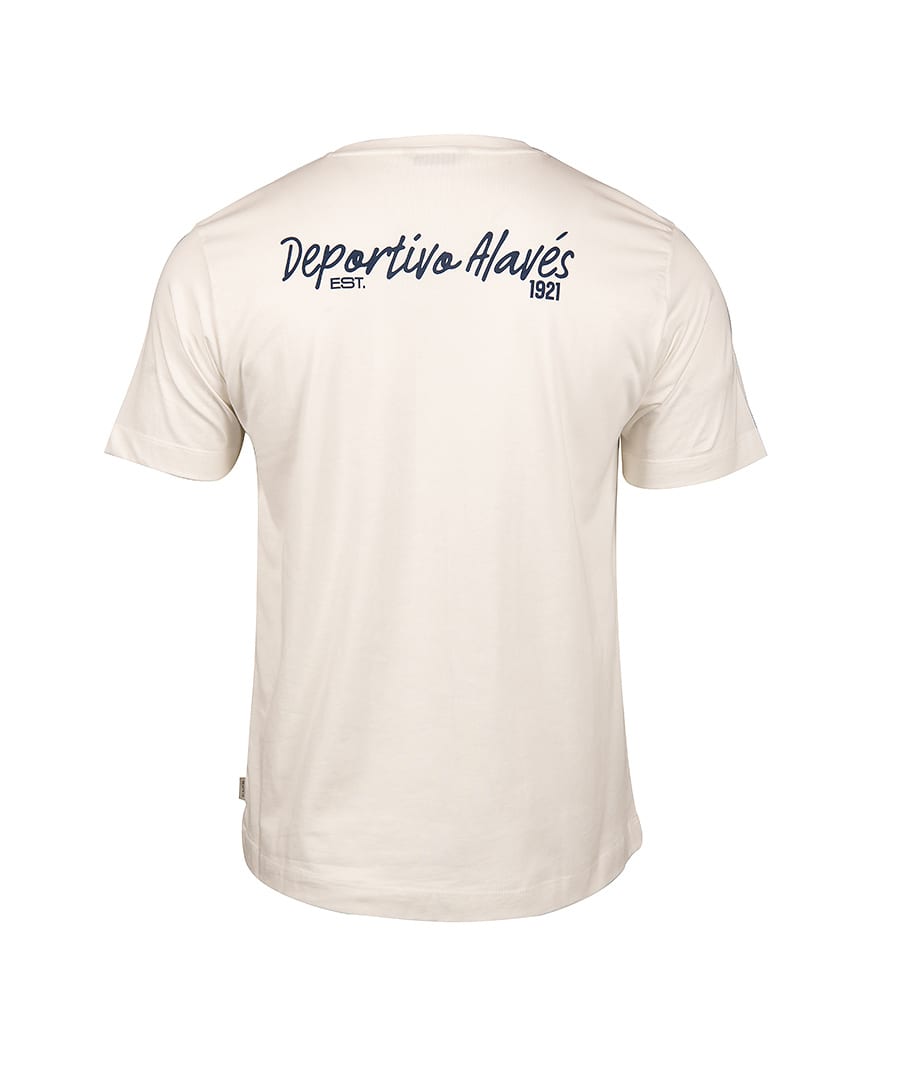 Back of a cream-colored t-shirt featuring 'Deportivo Alavés EST. 1921' in blue script.