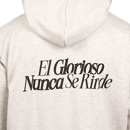 Light grey hoodie with black text 'El Glorioso Nunca Se Rinde' printed on the back.