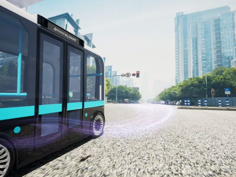 Mode of transport, Motor vehicle, Tire, Building, Wheel, Sky, Bus, Window, Asphalt