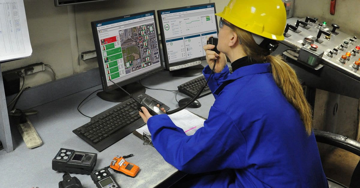 Personal computer, Hard hat, Input device, Helmet, Table, Workwear, Desk