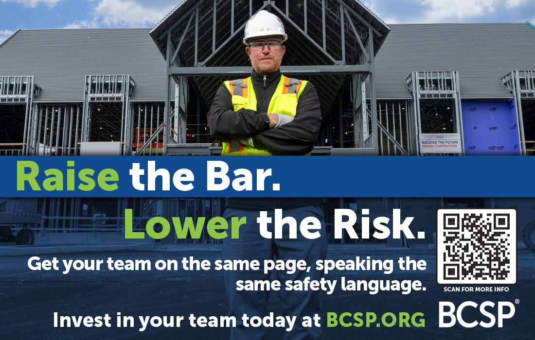 A construction worker in hard hat and safety vest promotes safety: "Raise the Bar. Lower the Risk."