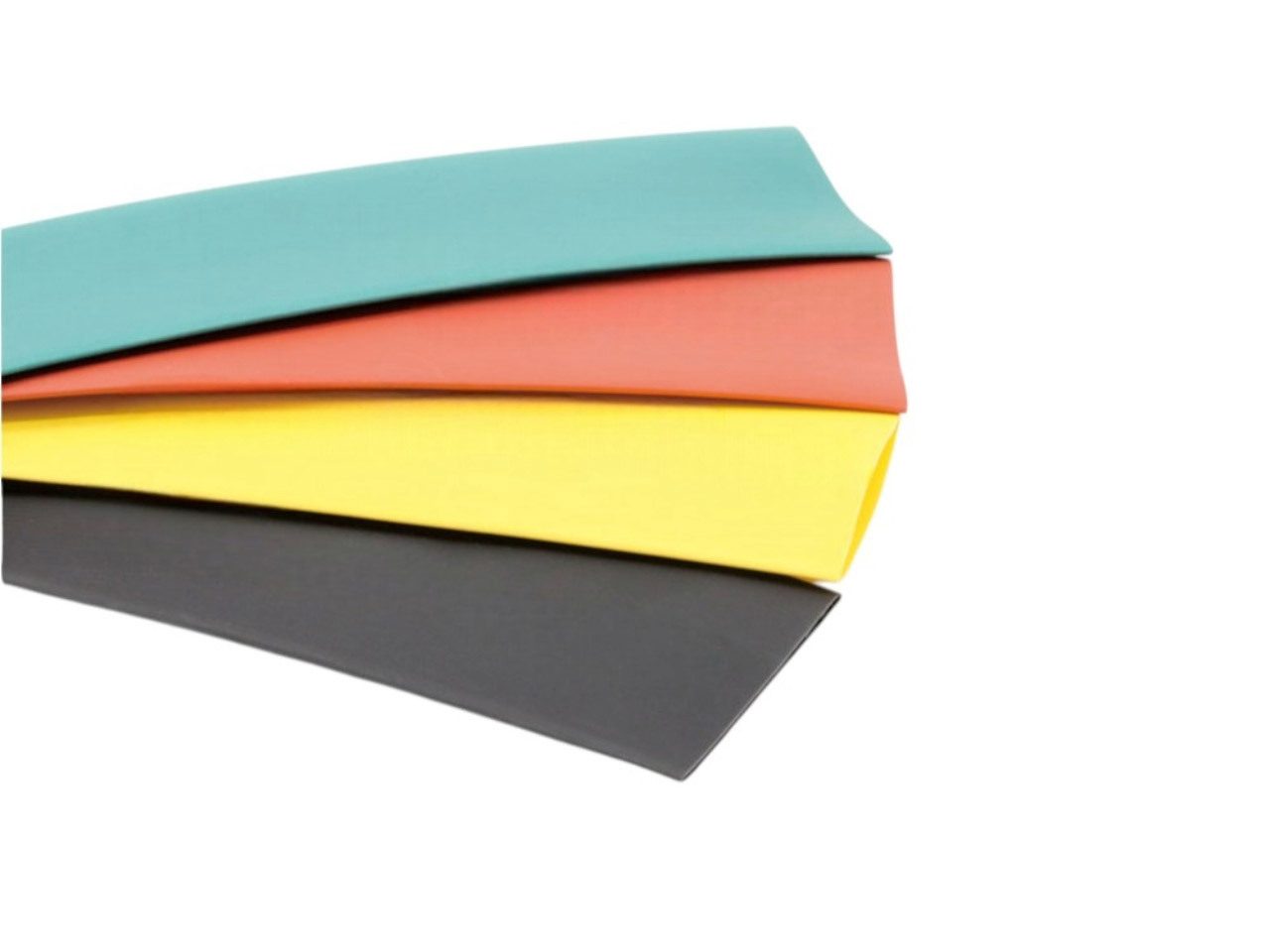 Four colorful strips of heat shrink tubing in teal, red, yellow, and black.