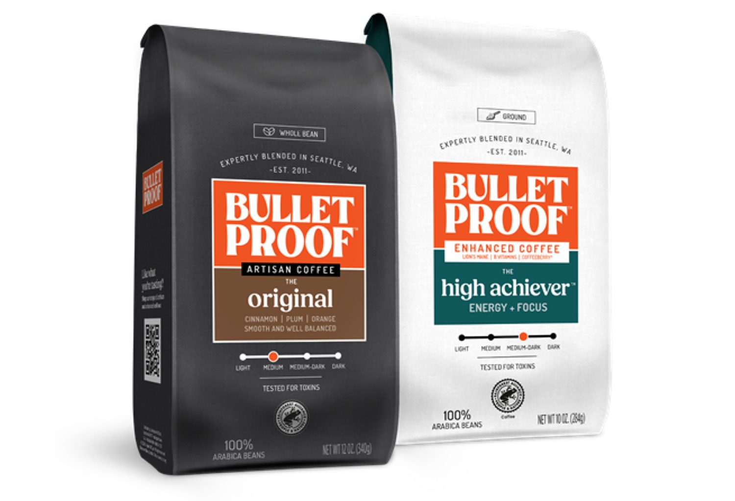 Black and white packages of Bulletproof coffee against white background