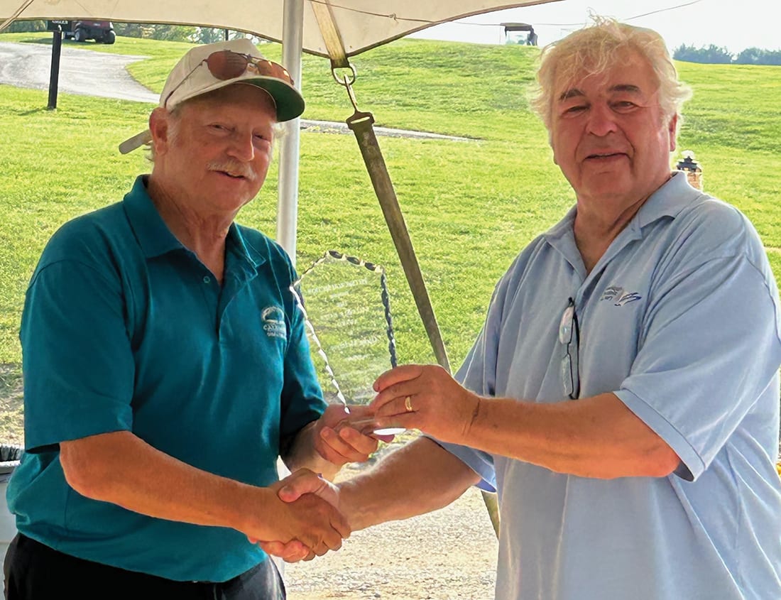 Eric Young, right, presents Glenn McIntyre with the ACerS Pittsburgh Section William S. Bates Award