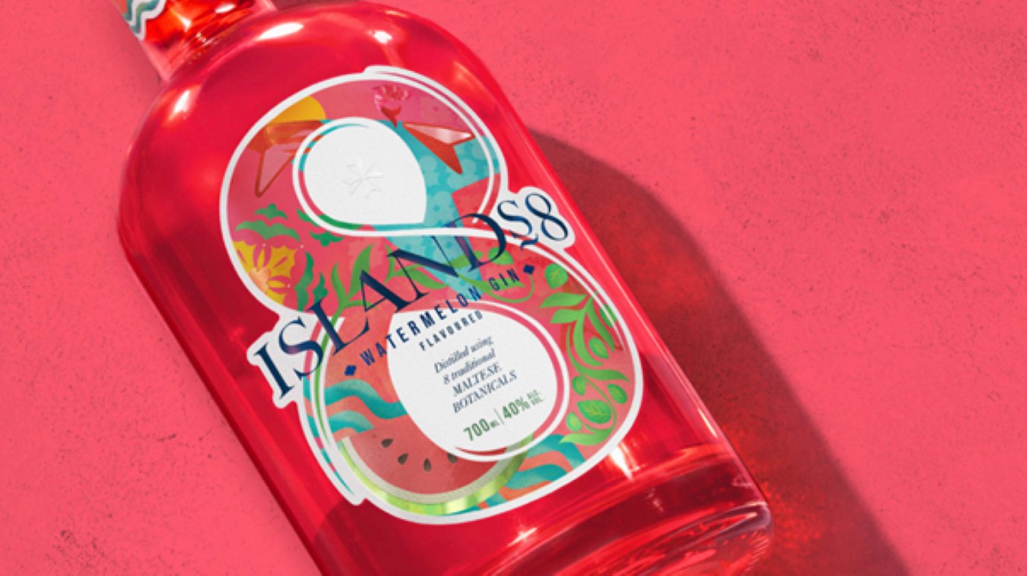 Close shot of Islands8 Watermelon Gin against vibrant red background