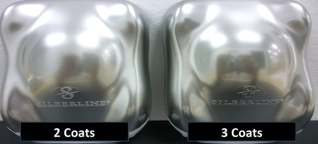 Pigment D formulated at the same pigment-to-binder ratio (1:1), two coats vs three coats to target film build.