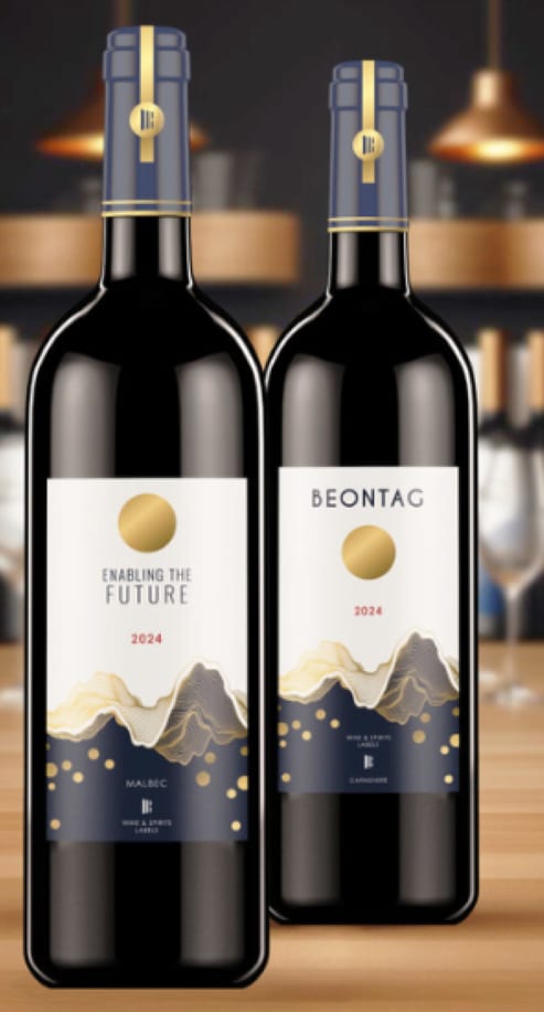 Wine bottles with adhesive labels on them