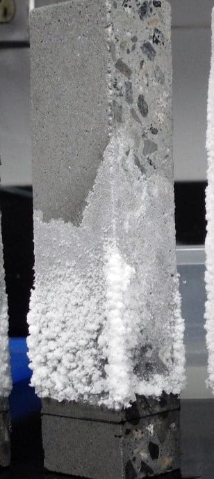 Relative efflorescence performance of two acrylic latex polymers of varying particle size and one solvent-based solution polymer.