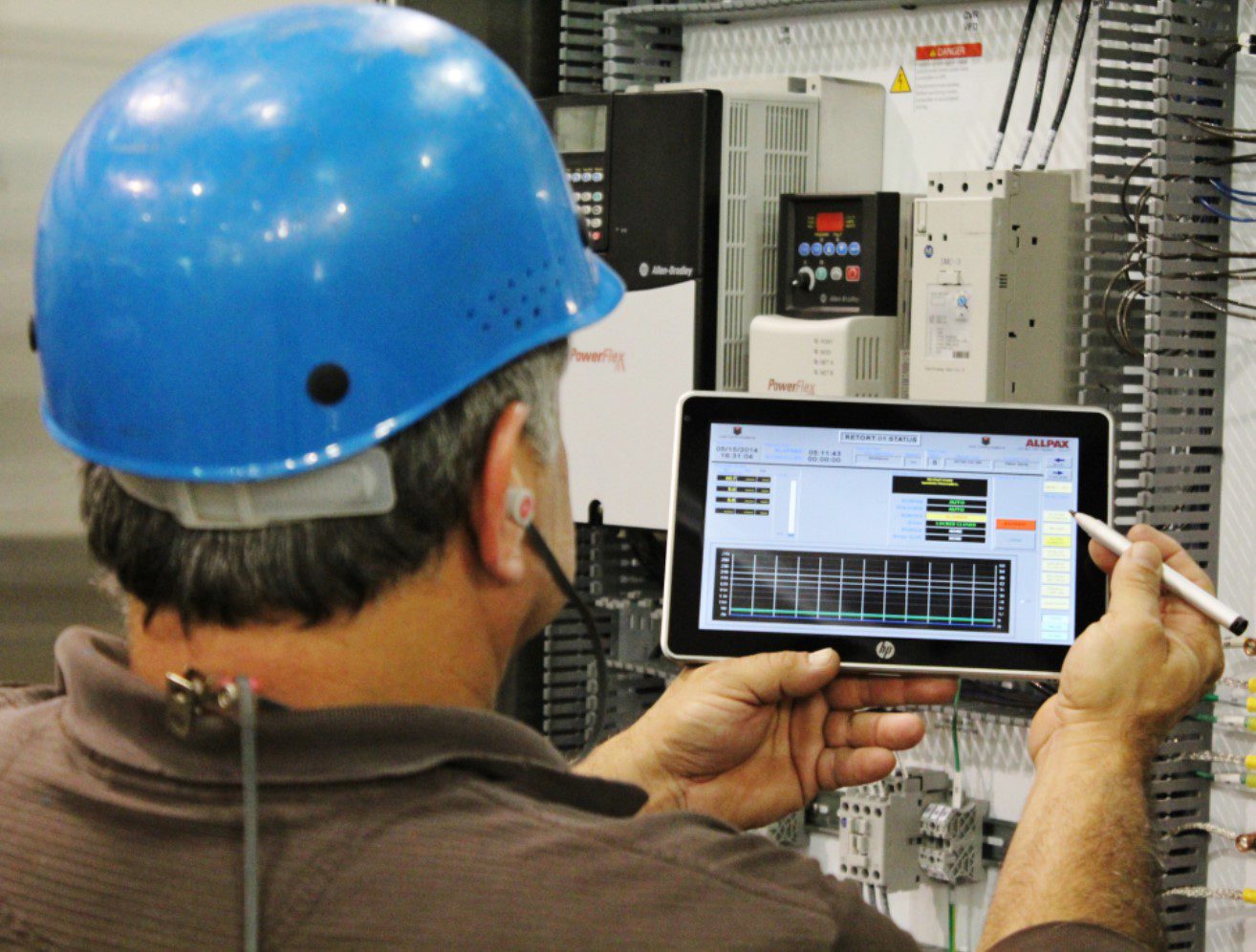 Employee using mobile HMI (human machine interface)