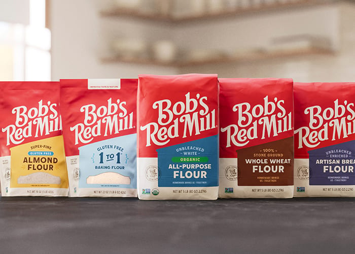 Bob’s Red Mill lineup of new packages on kitchen counter