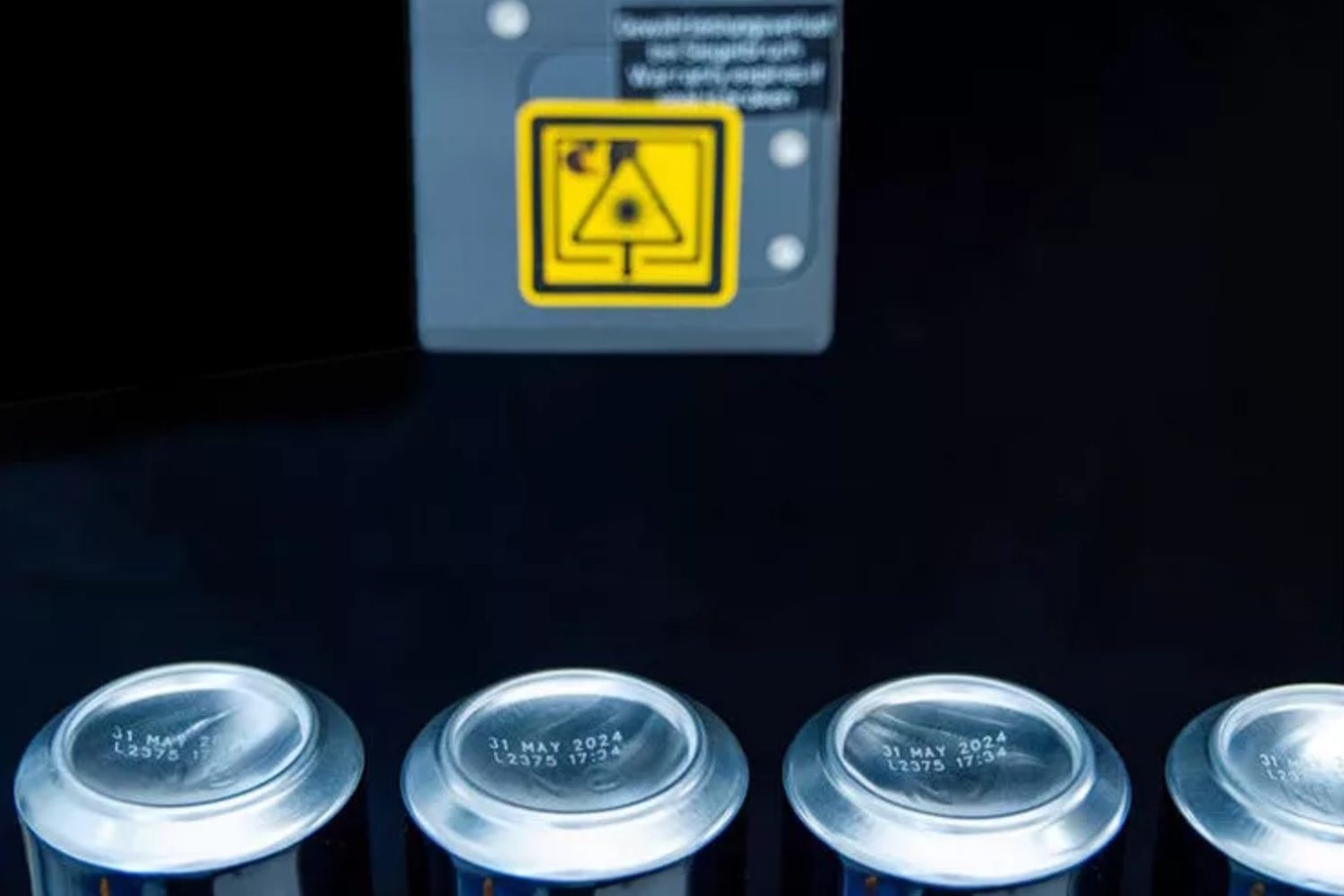 Domino f720i printing on cans